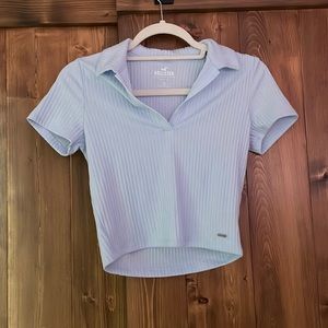 Hollister, low cut collared, light blue shirt size medium.